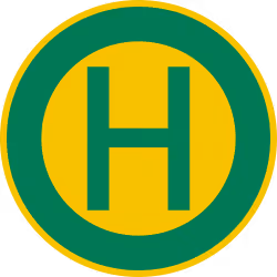 Grünes H auf gelbem Kreis mit grünem Rand, deutsches Haltestellenschild für Bus und Bahn.
