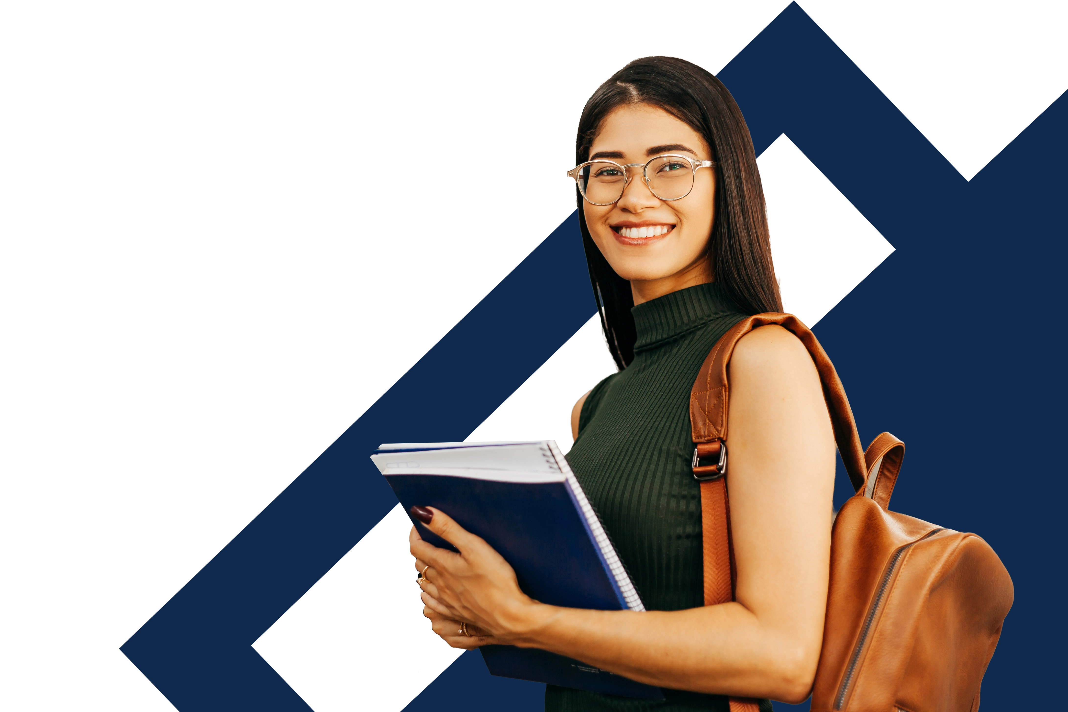 A woman smiling and holding books