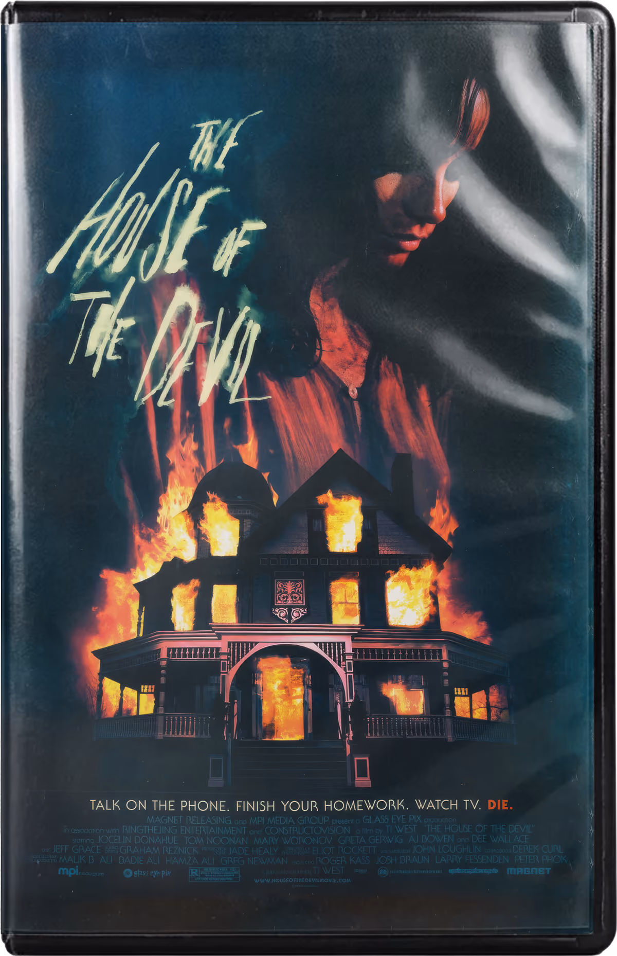 The House of the Devil VHS cover showing a house in flames