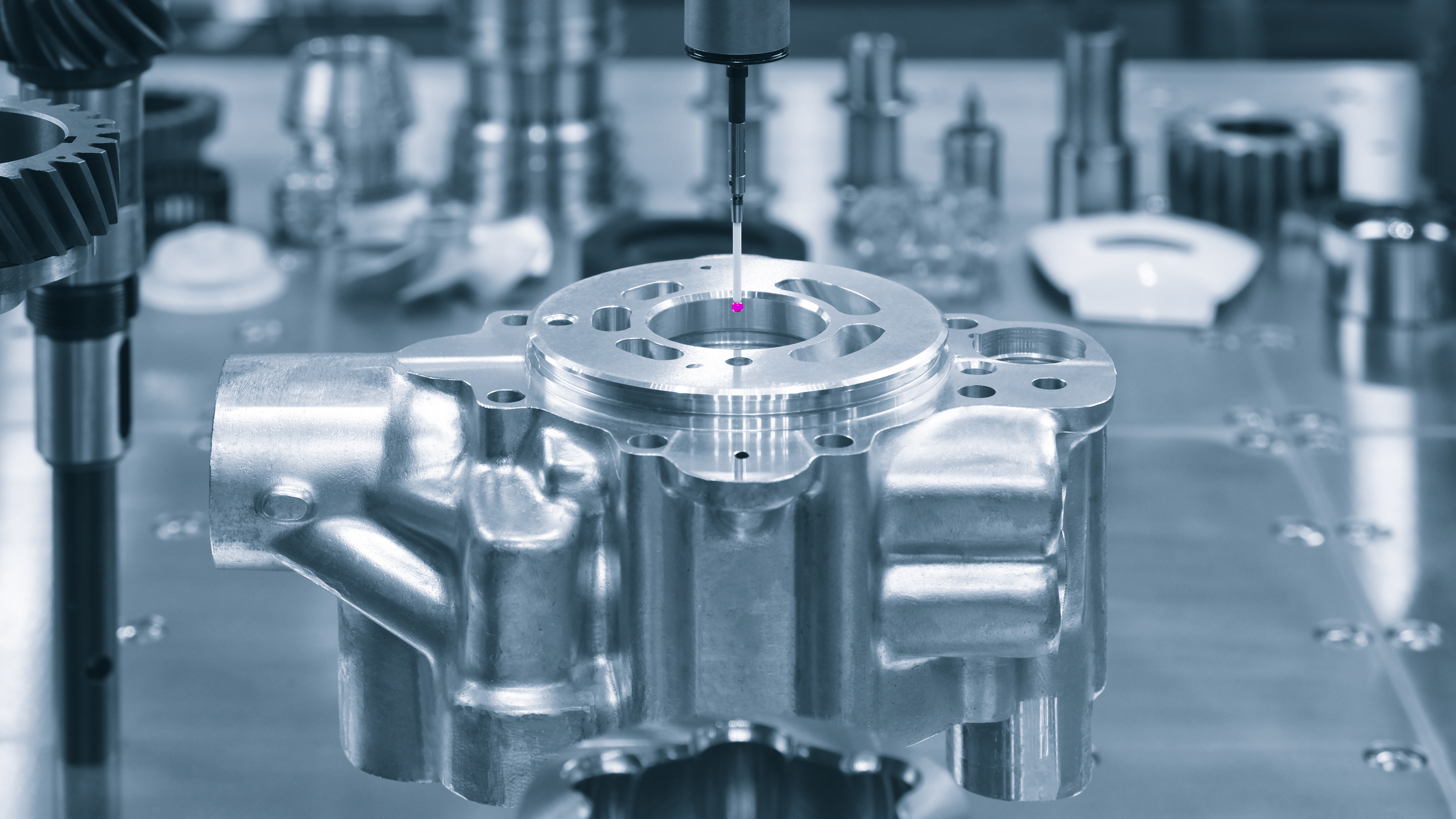 CMM probe measuring precision aluminum aerospace housing — in-process quality verification