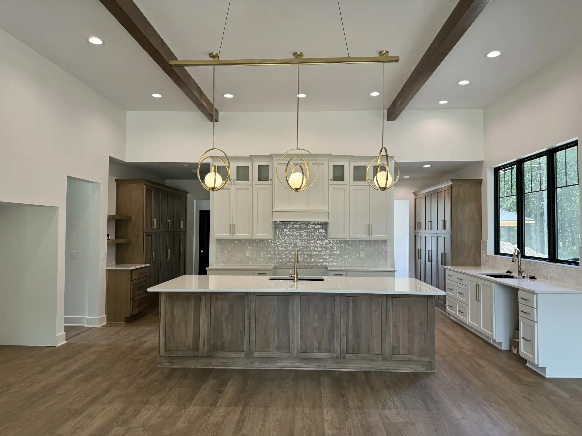 open kitchen area with sink in island