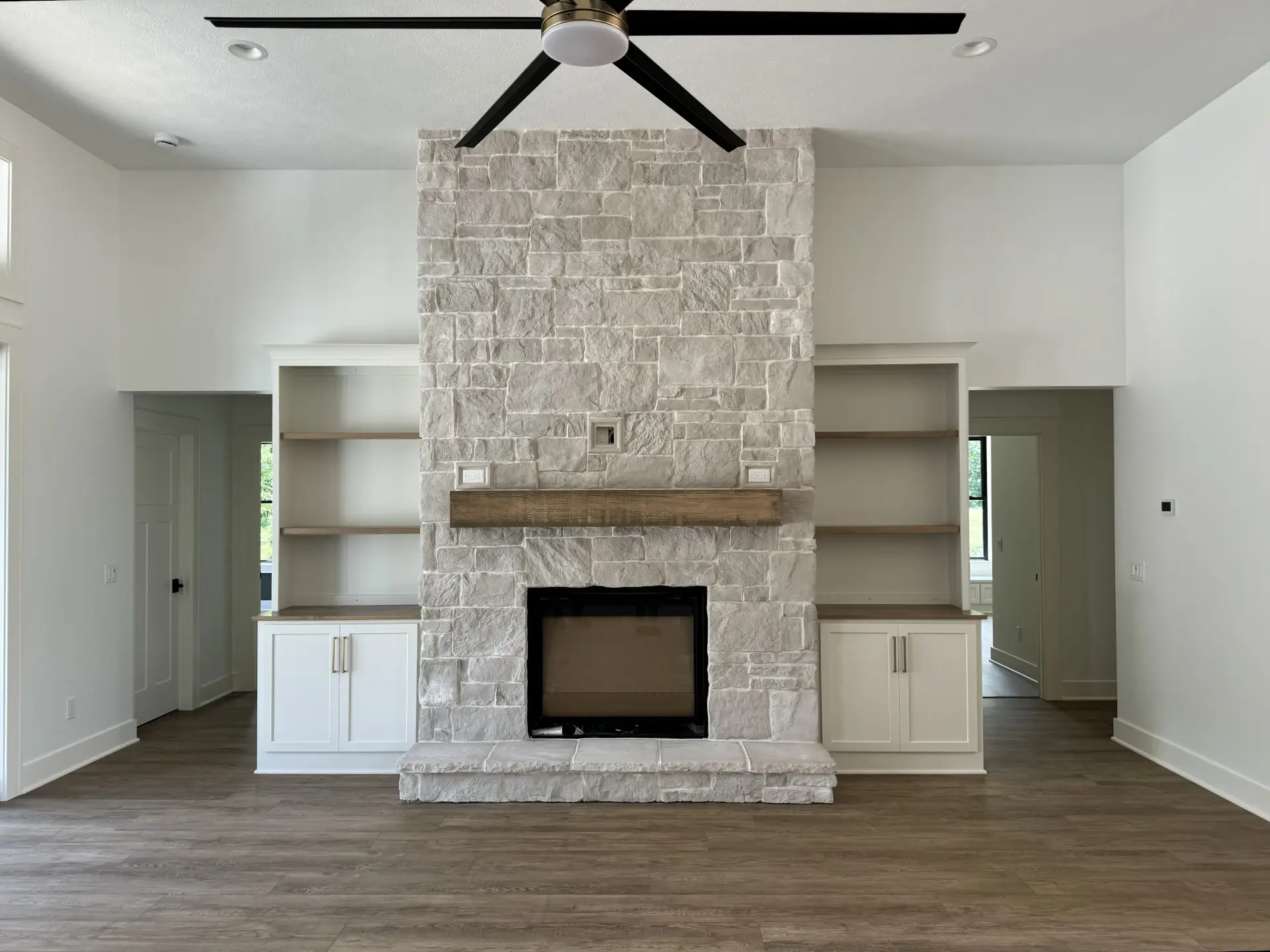 built in shelving around fireplace