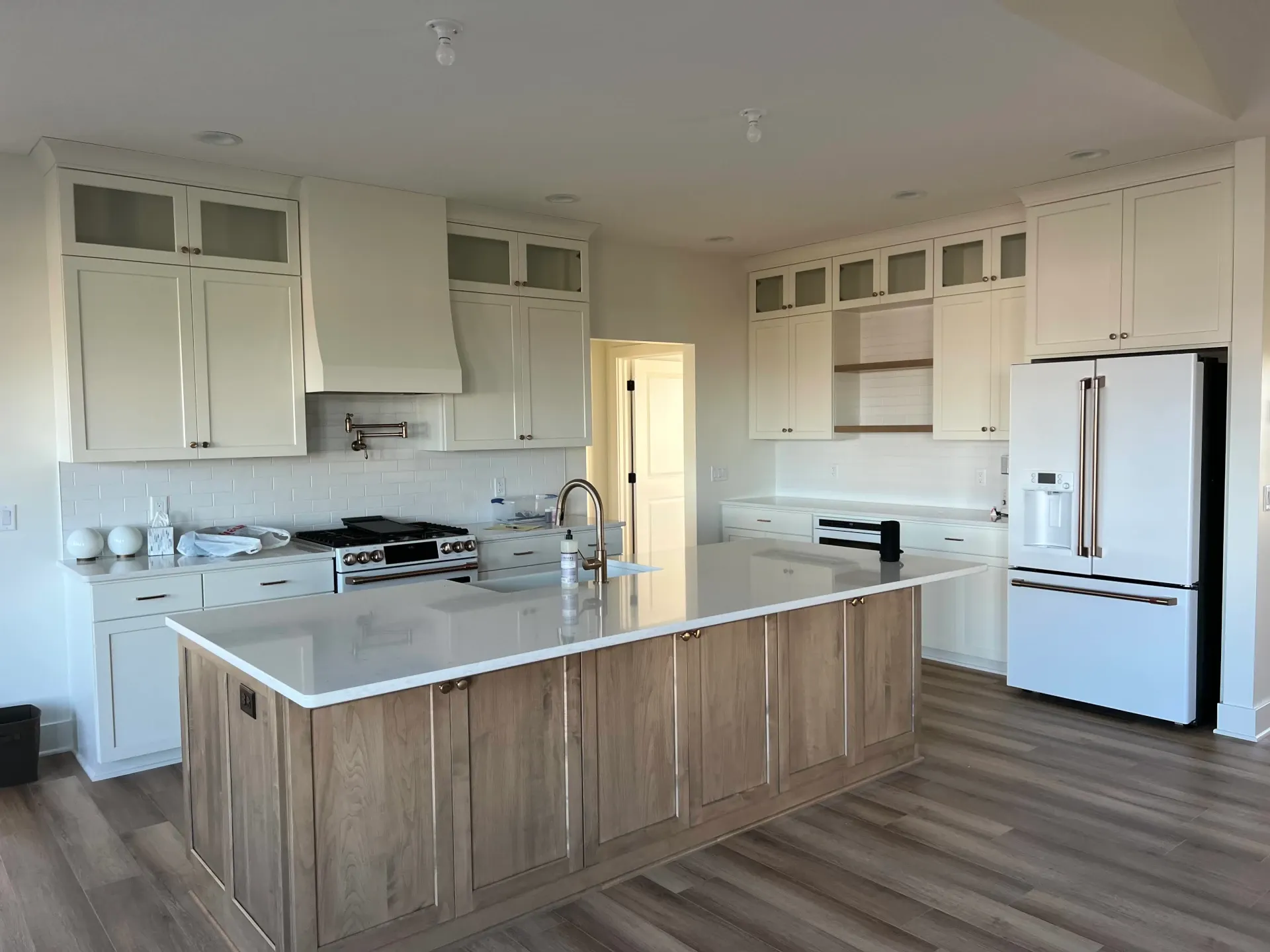 new kitchen with white cabinets