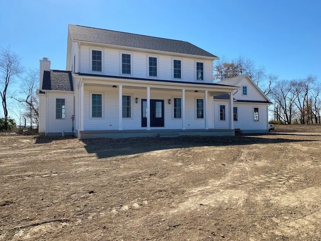 two story home with long front porch