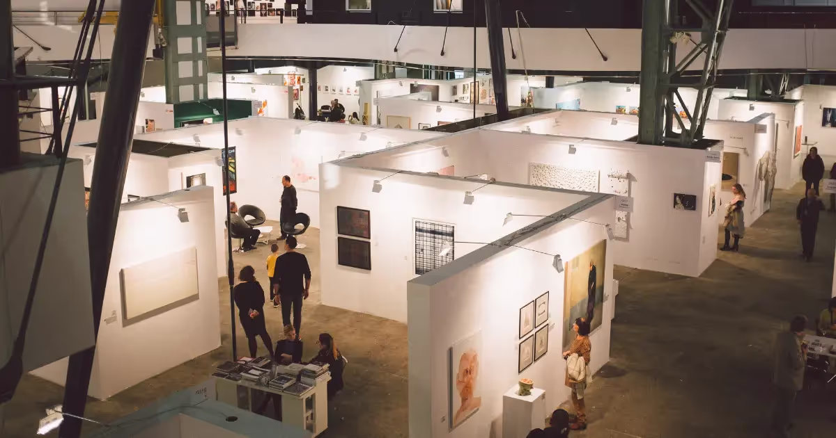 Aerial shot of exhibition stand lit up.