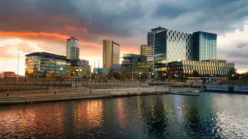 Manchester skyline at sunset.