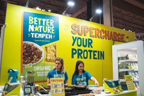 Vibrant, custom-made event stand set up by Eventfull
