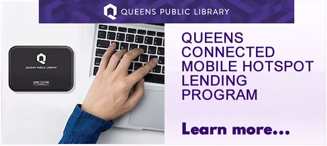 Person using laptop next to Queens Public Library mobile hotspot device