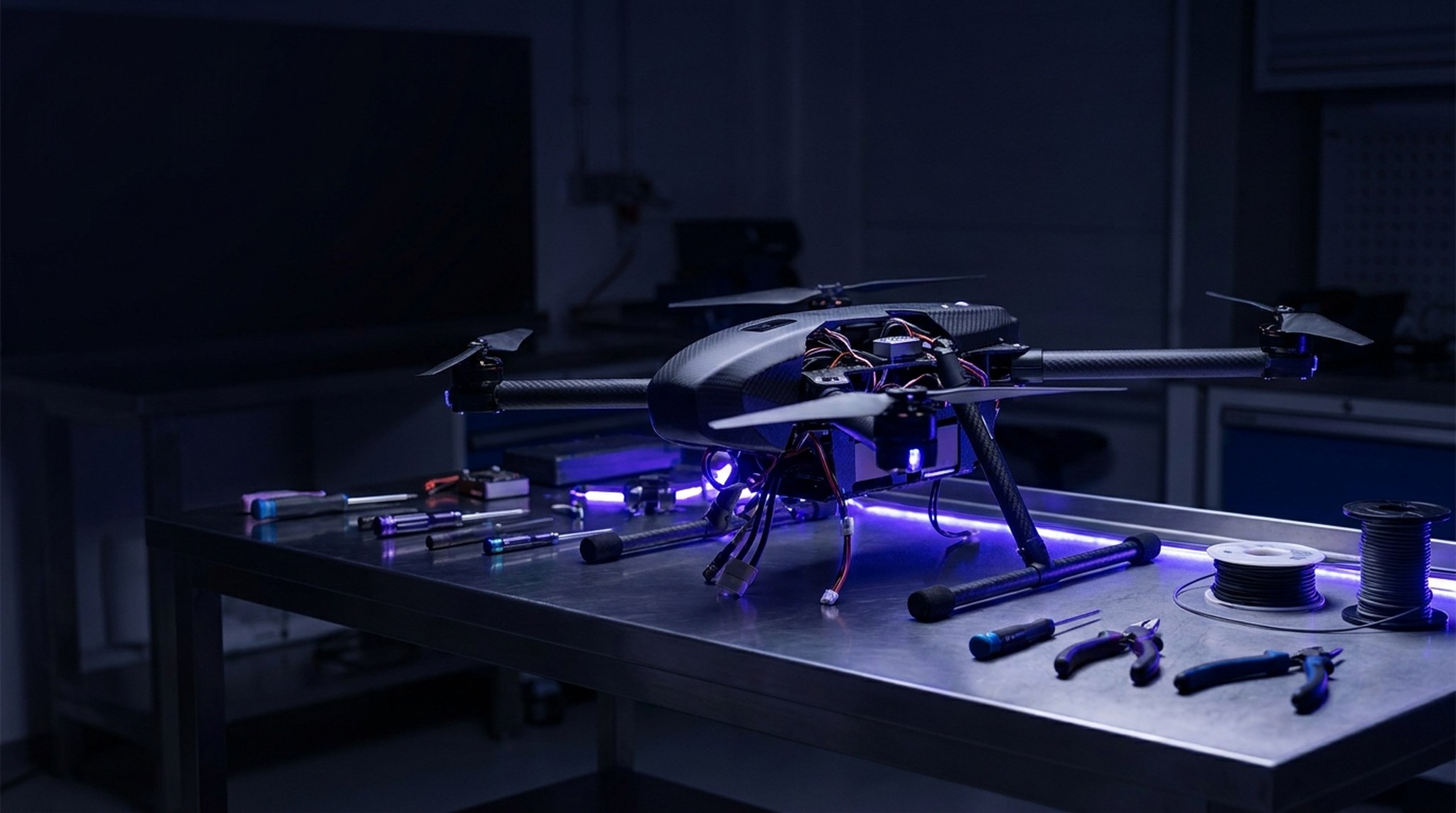 Custom carbon-fibre Skyber UAV airframe on an engineering bench