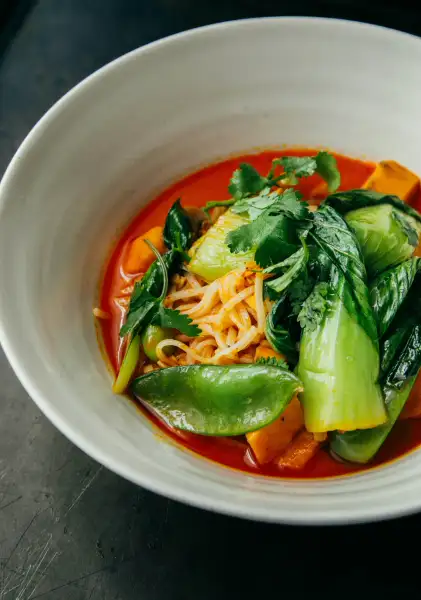 Spicy noodle soup with bok choy