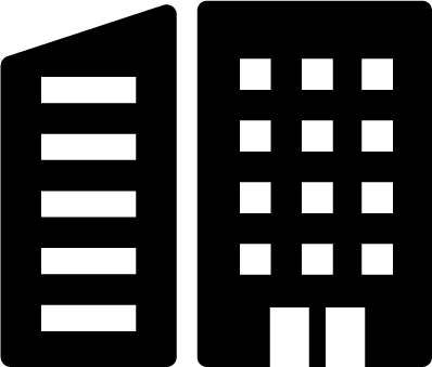 Icon of two adjacent buildings, one with horizontal lines and the other with square windows and a door.