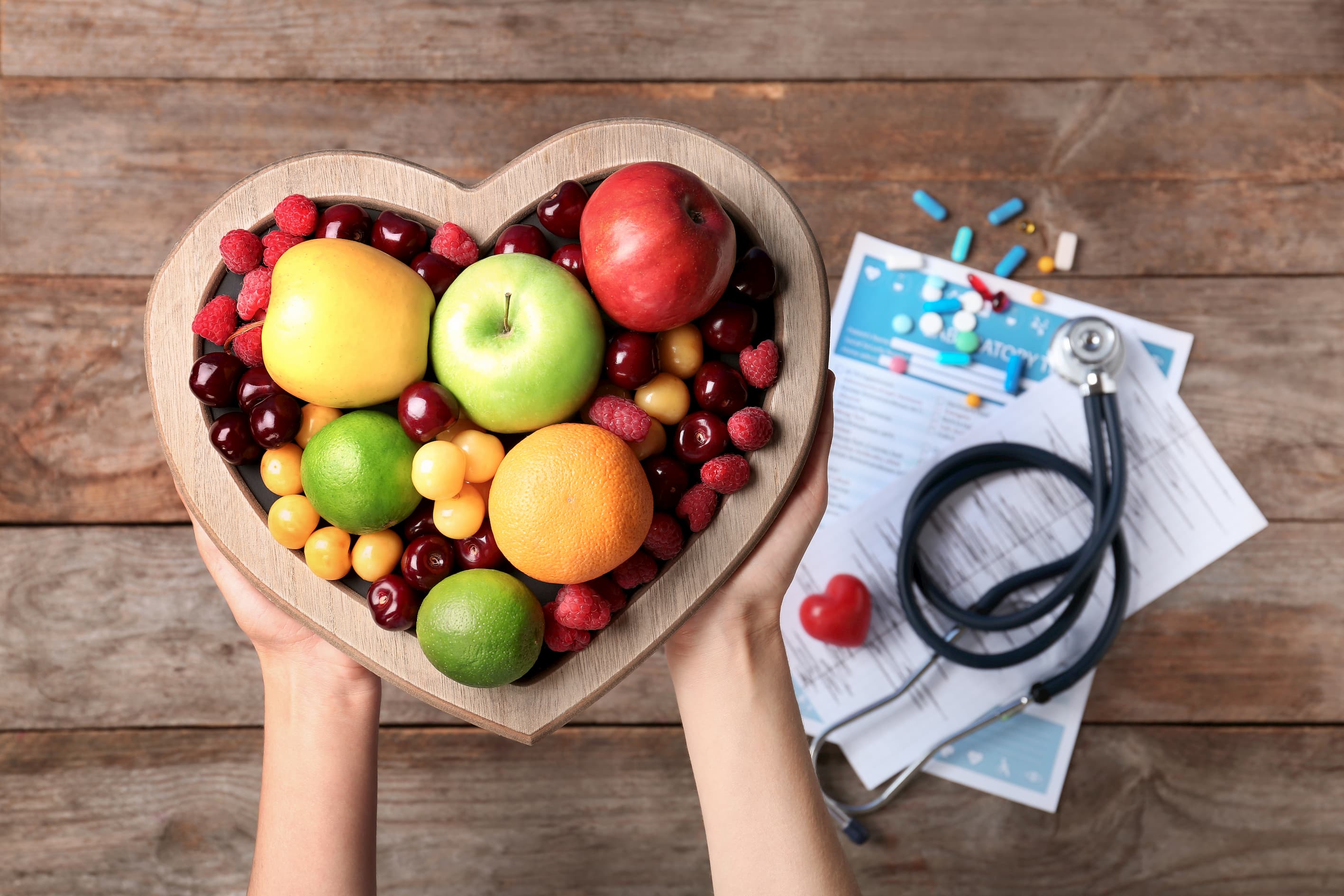 Heart shaped bowl filled with fruit