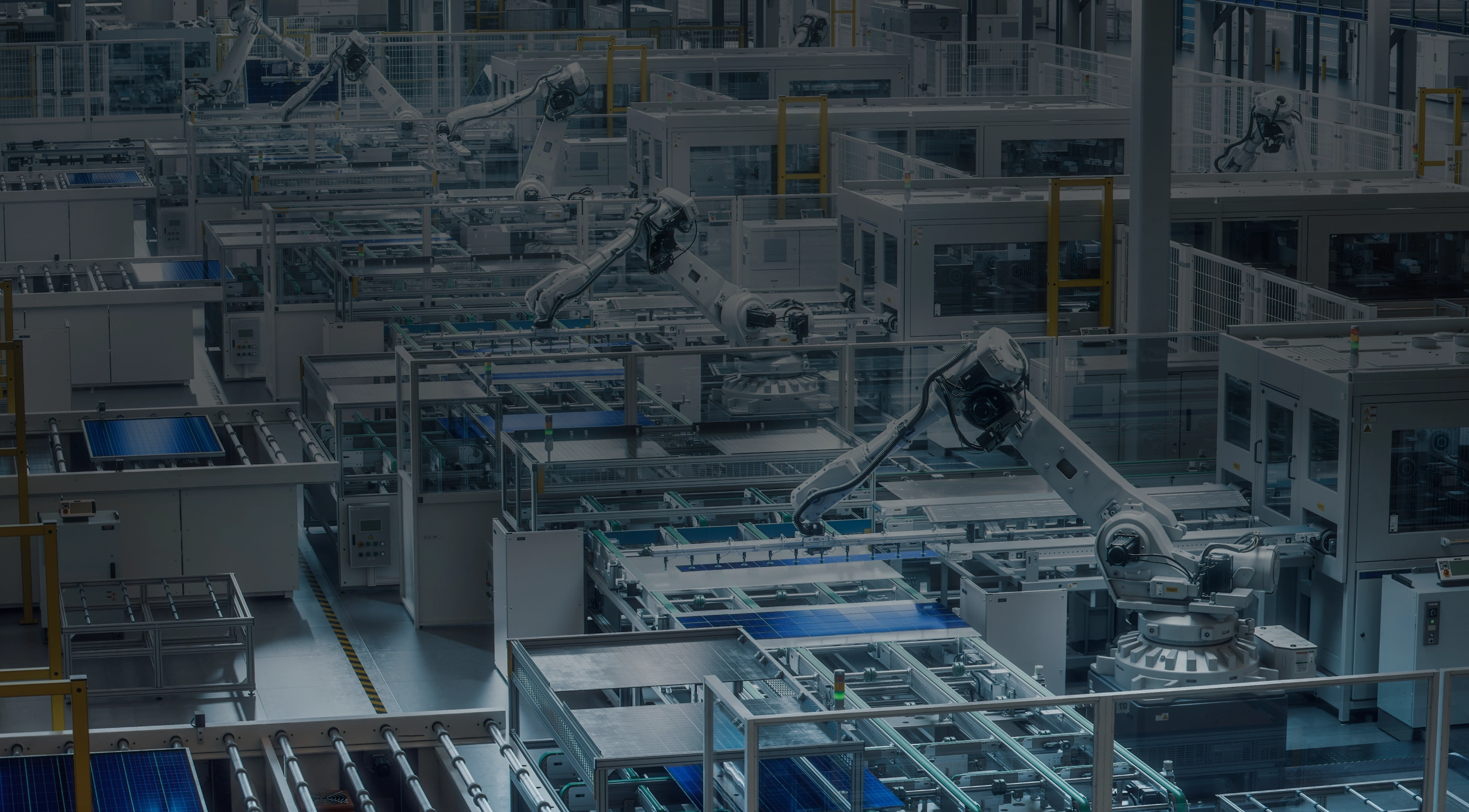 Automated factory assembly line with robotic arms handling solar panels in a high-tech manufacturing facility.
