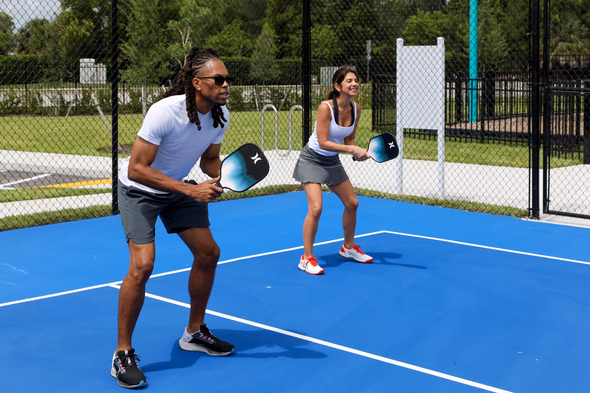 residents playing pickleball