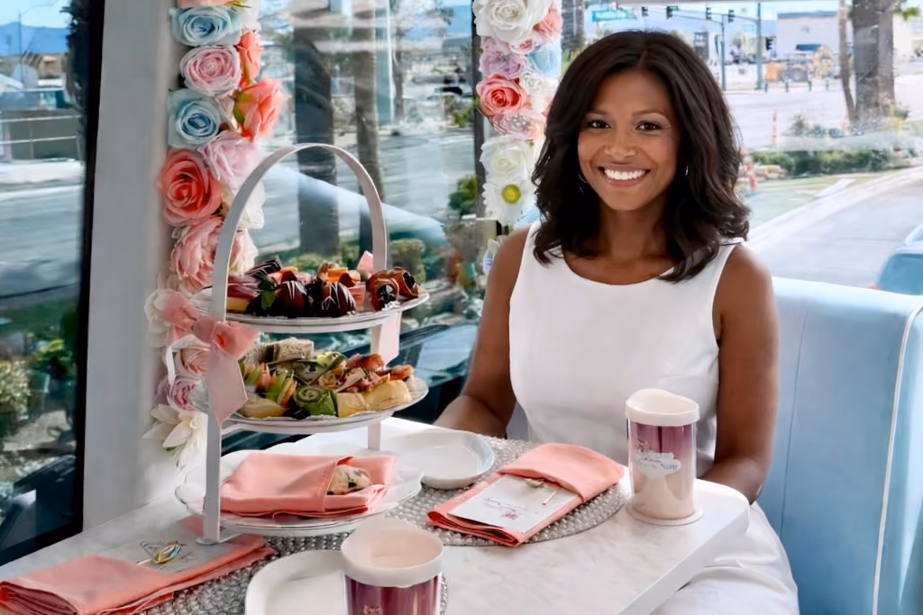 A birthday guest enjoying high tea