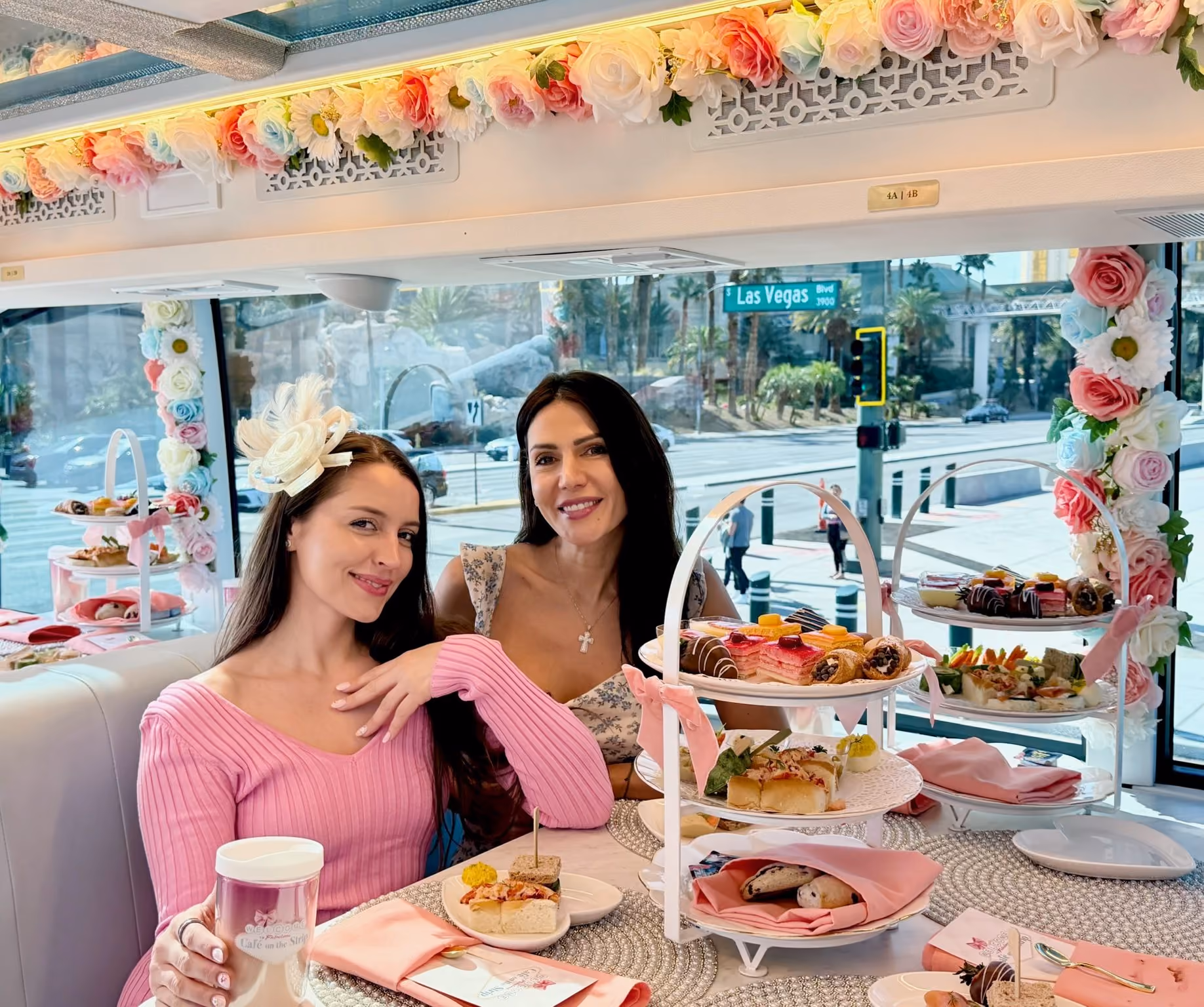 Friends enjoying high tea with a view of the Strip