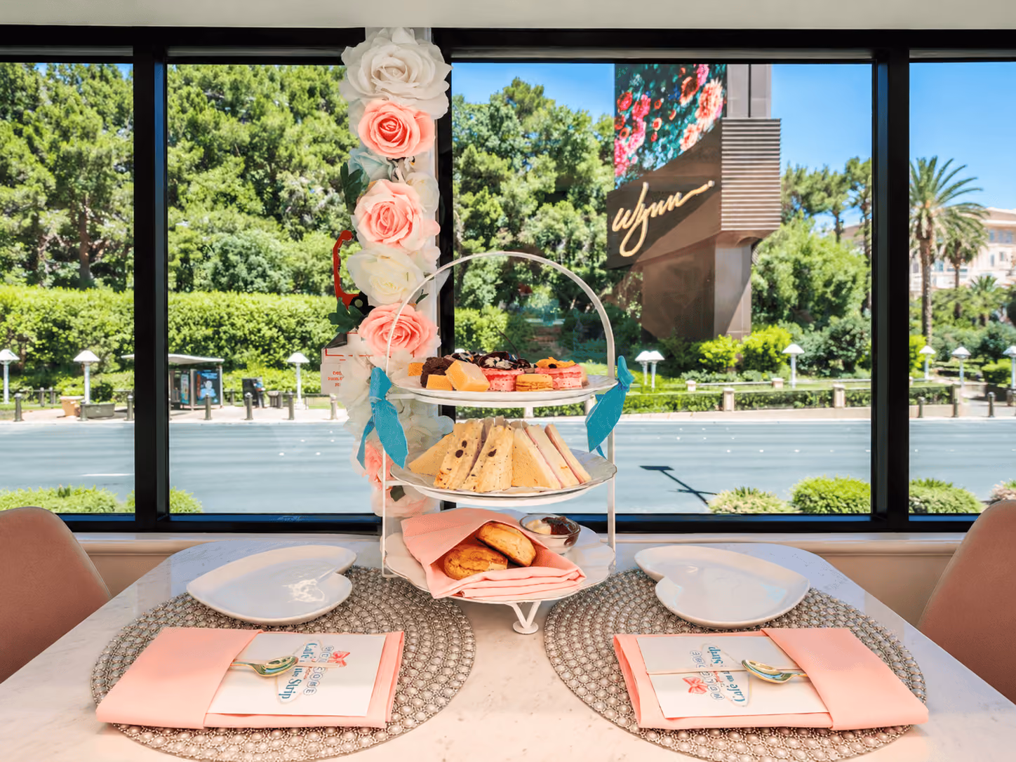 Guests with tea and views of the Las Vegas Strip