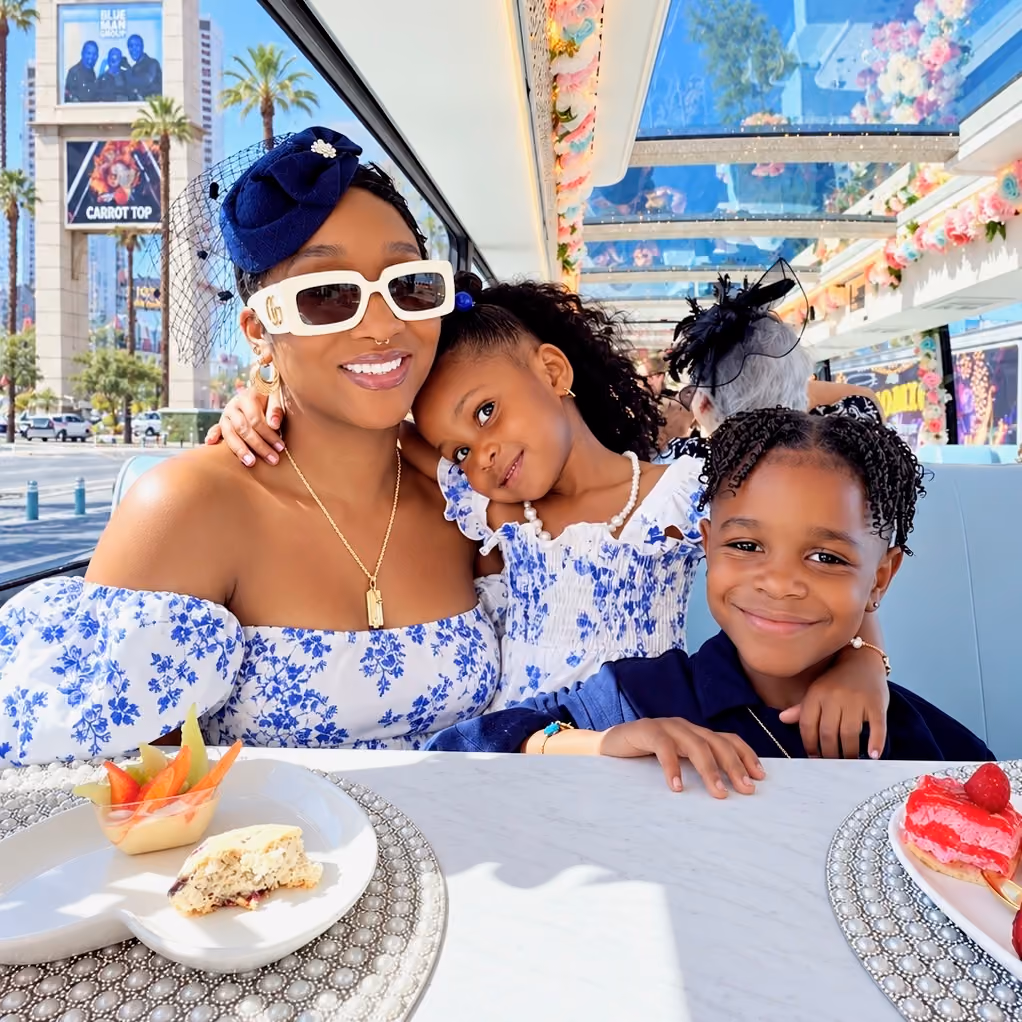 Guests enjoying high tea aboard the double-decker coach