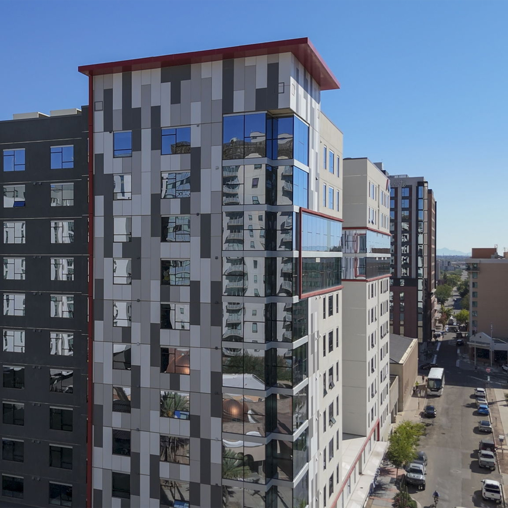 Exterior of a downtown high-rise student apartment building