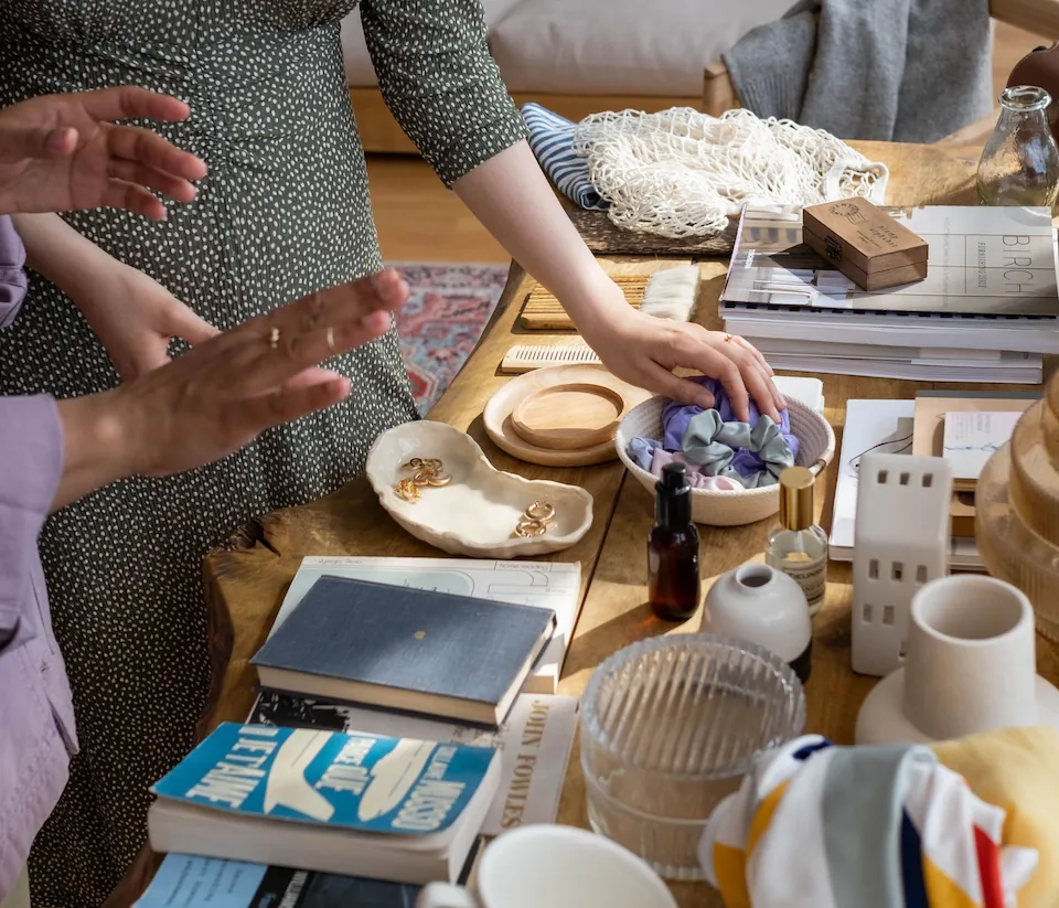 Two people curating gifts