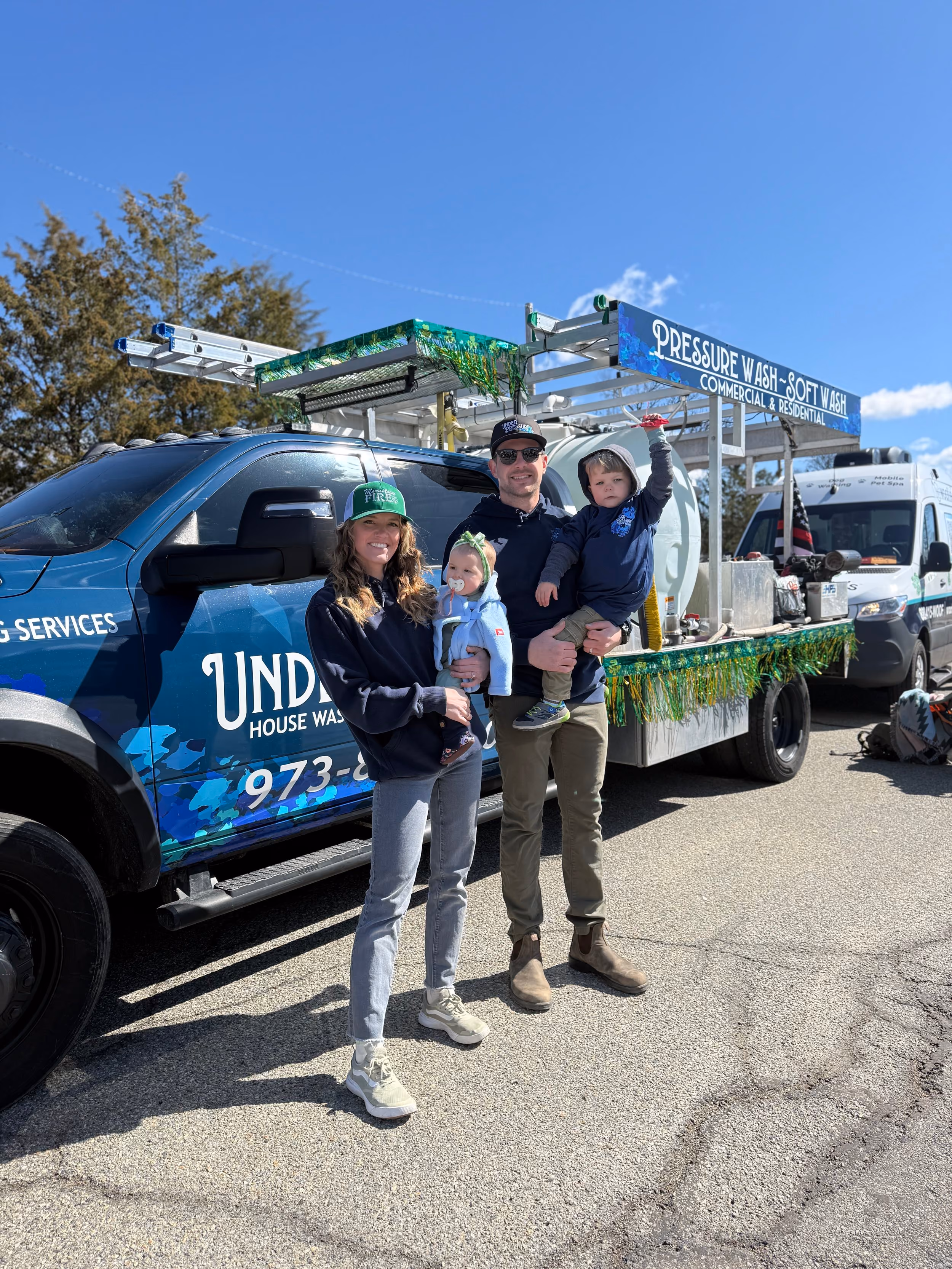 The Under Pressure House Washing team by their truck in New Jersey