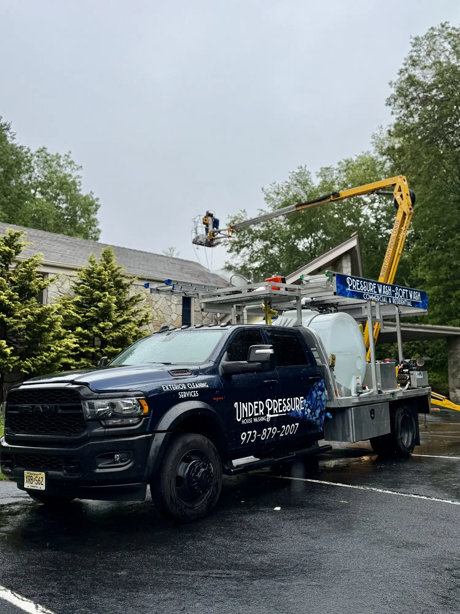 Soft washing a roof in Denville, NJ