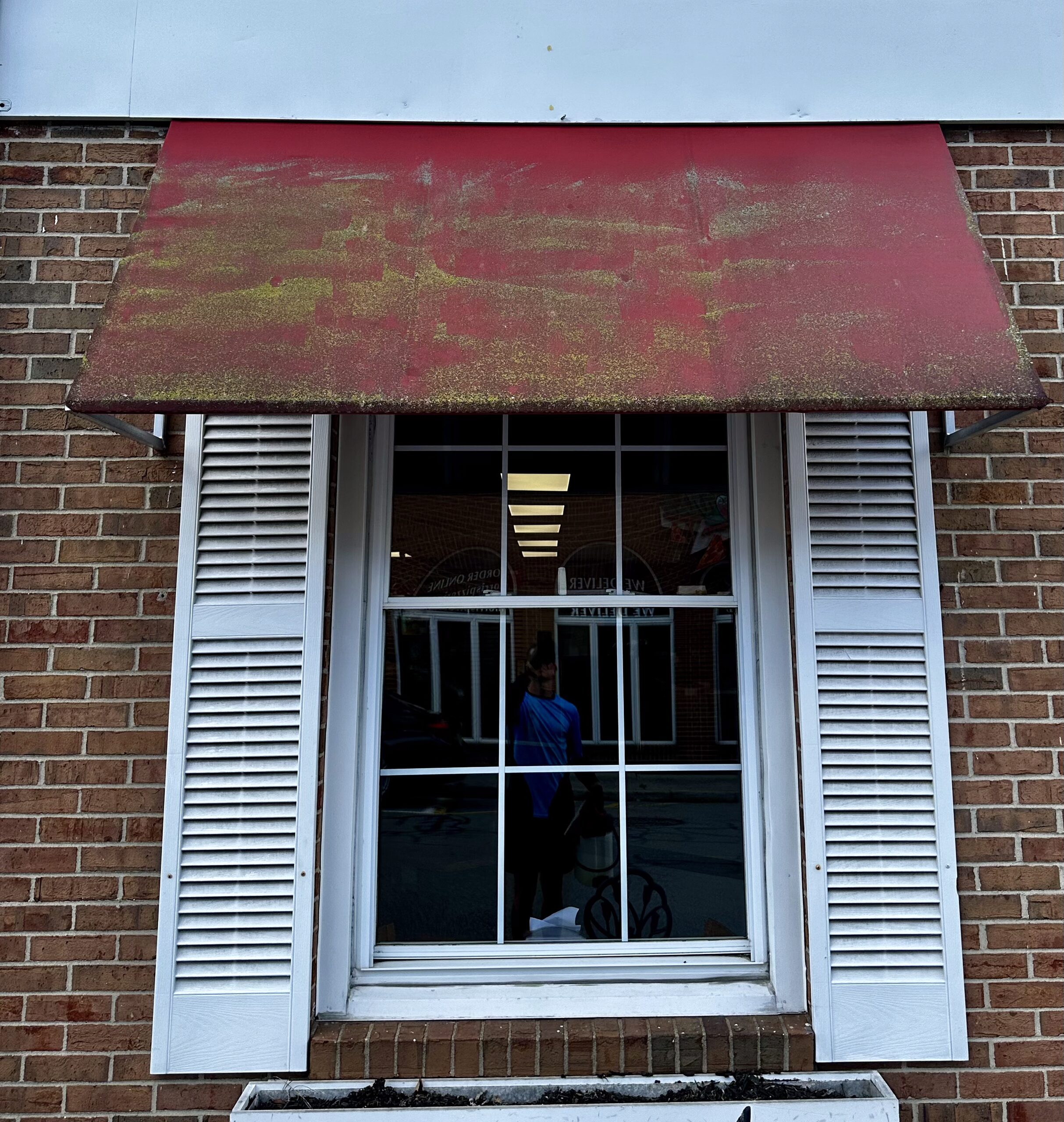 Commercial brick building cleaning before and after in New Jersey