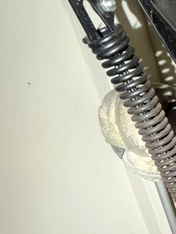 Close-up of a garage door spring replaced on a Los Angeles service call