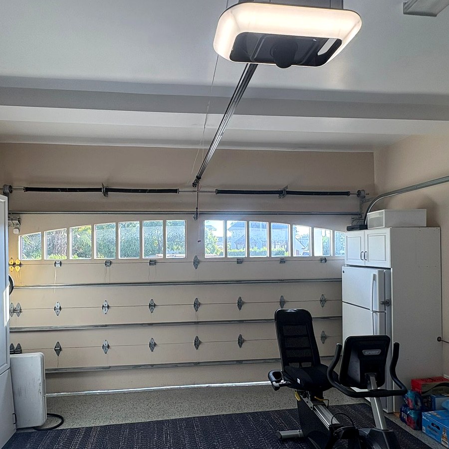 Finished garage door and new opener after the final safety check in Carpinteria