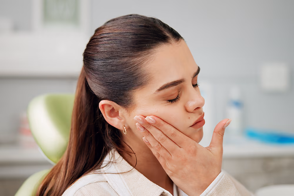 Emergency dental exam for a painful failing tooth