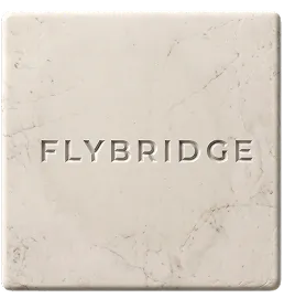 Square marble tile with subtle veins and the word FLYBRIDGE engraved in the center.