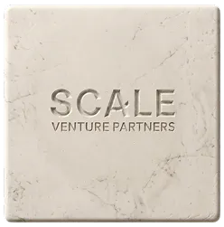 Square stone tile with SCALE VENTURE PARTNERS engraved in the center.