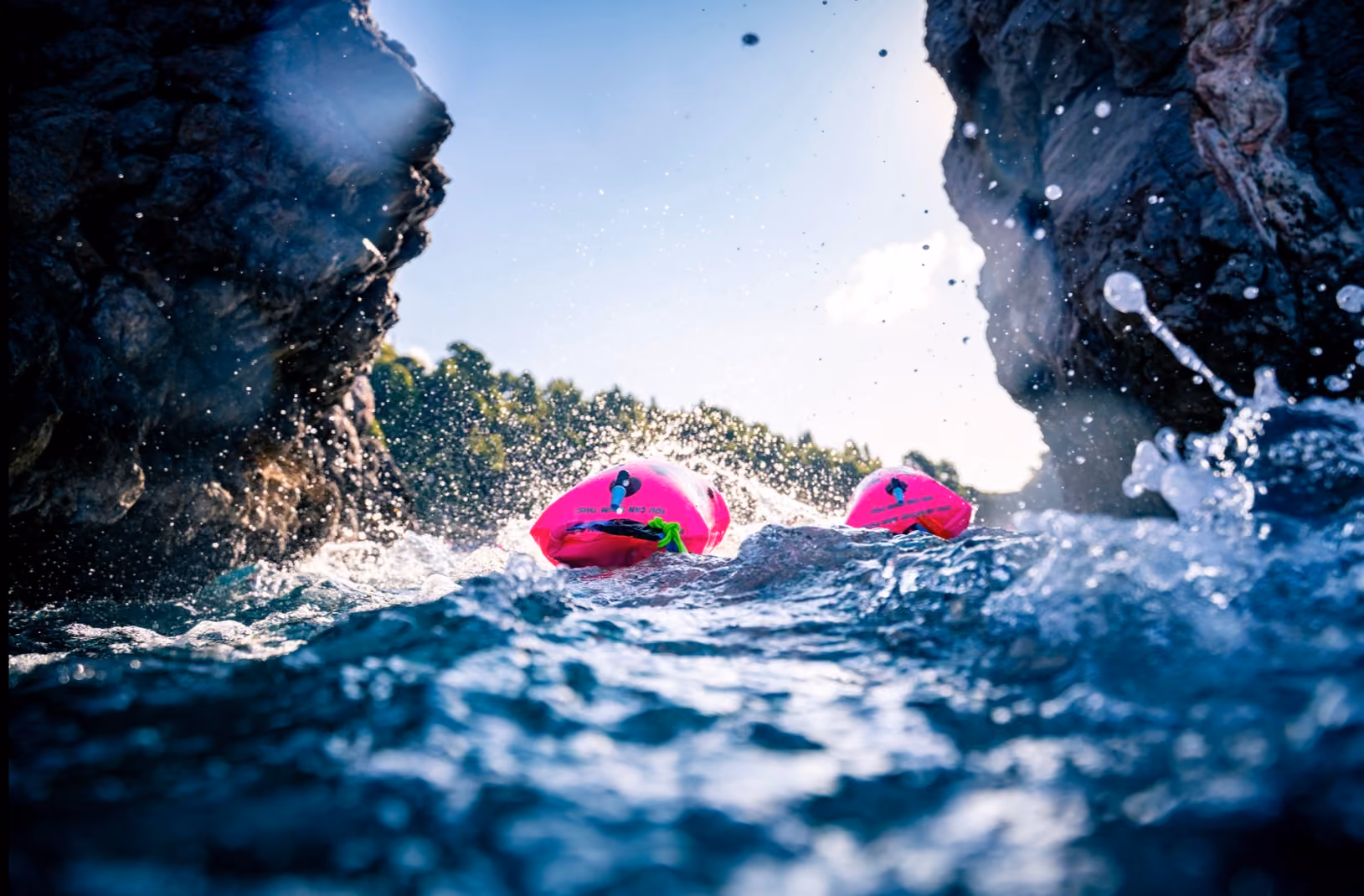 Swimmers in warm open water at an UltraSwim 33.3 event in Greece