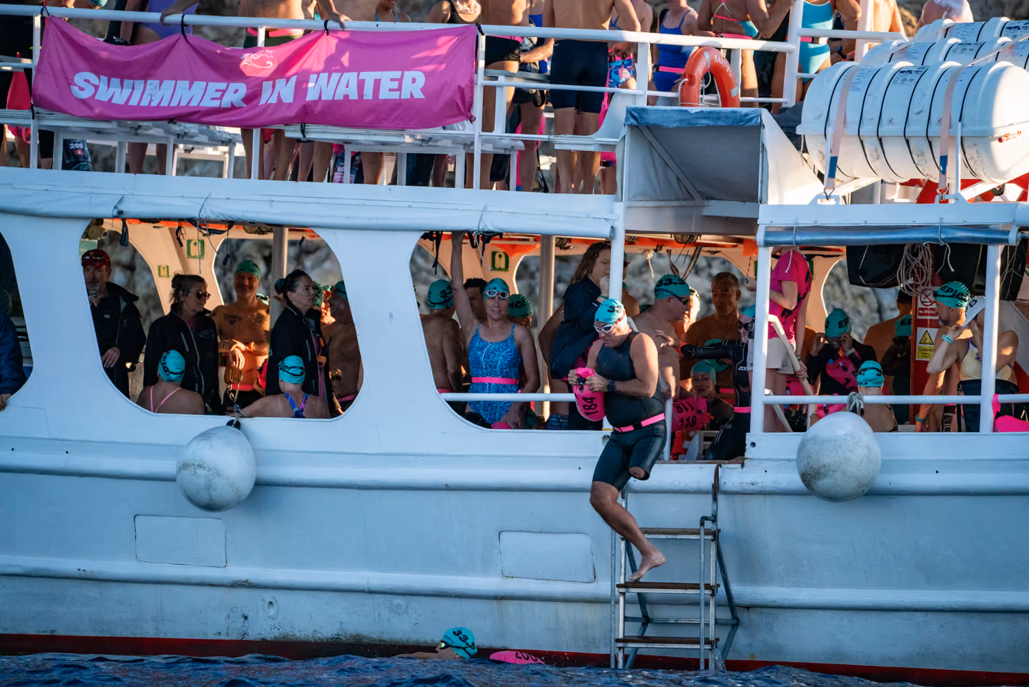 UltraSwim 33.3 #9 Greece, swimmer jumping in
