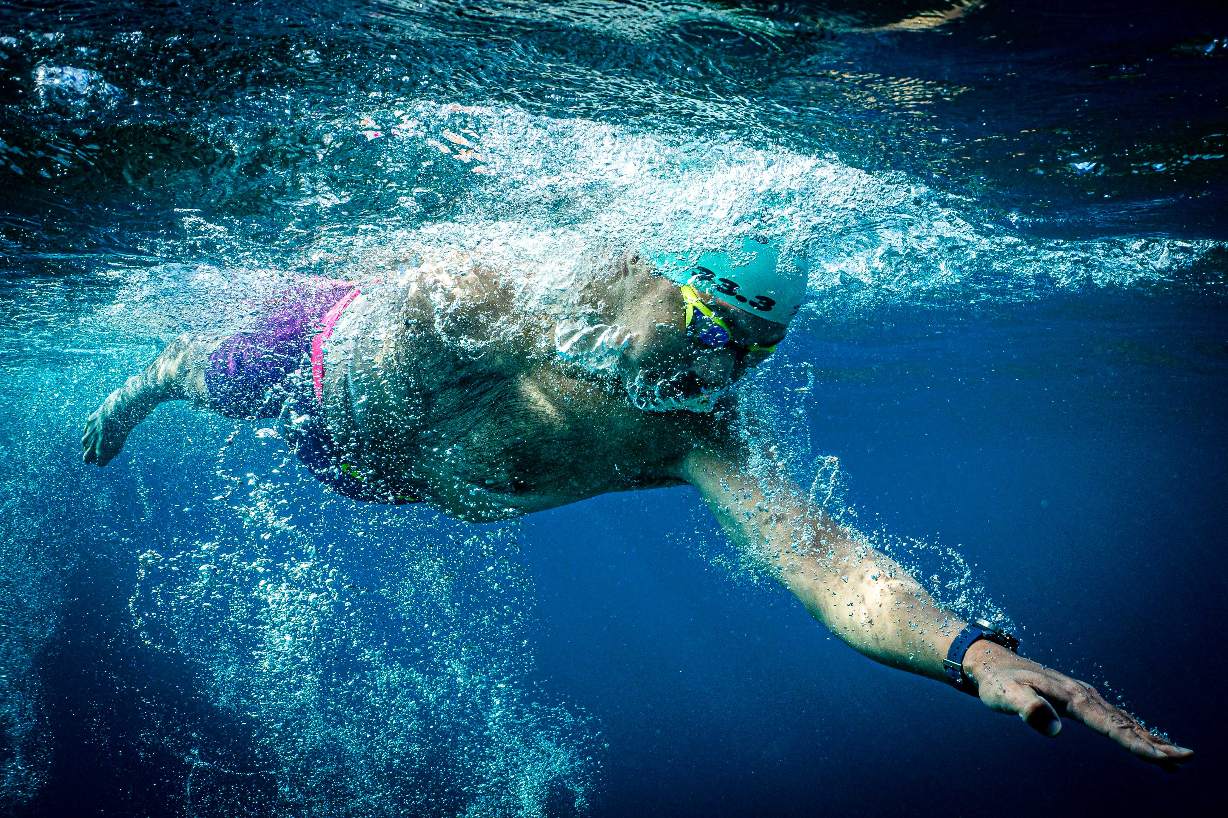 UltraSwim 33.3 #10 Montenegro, underwater view of a swimmer