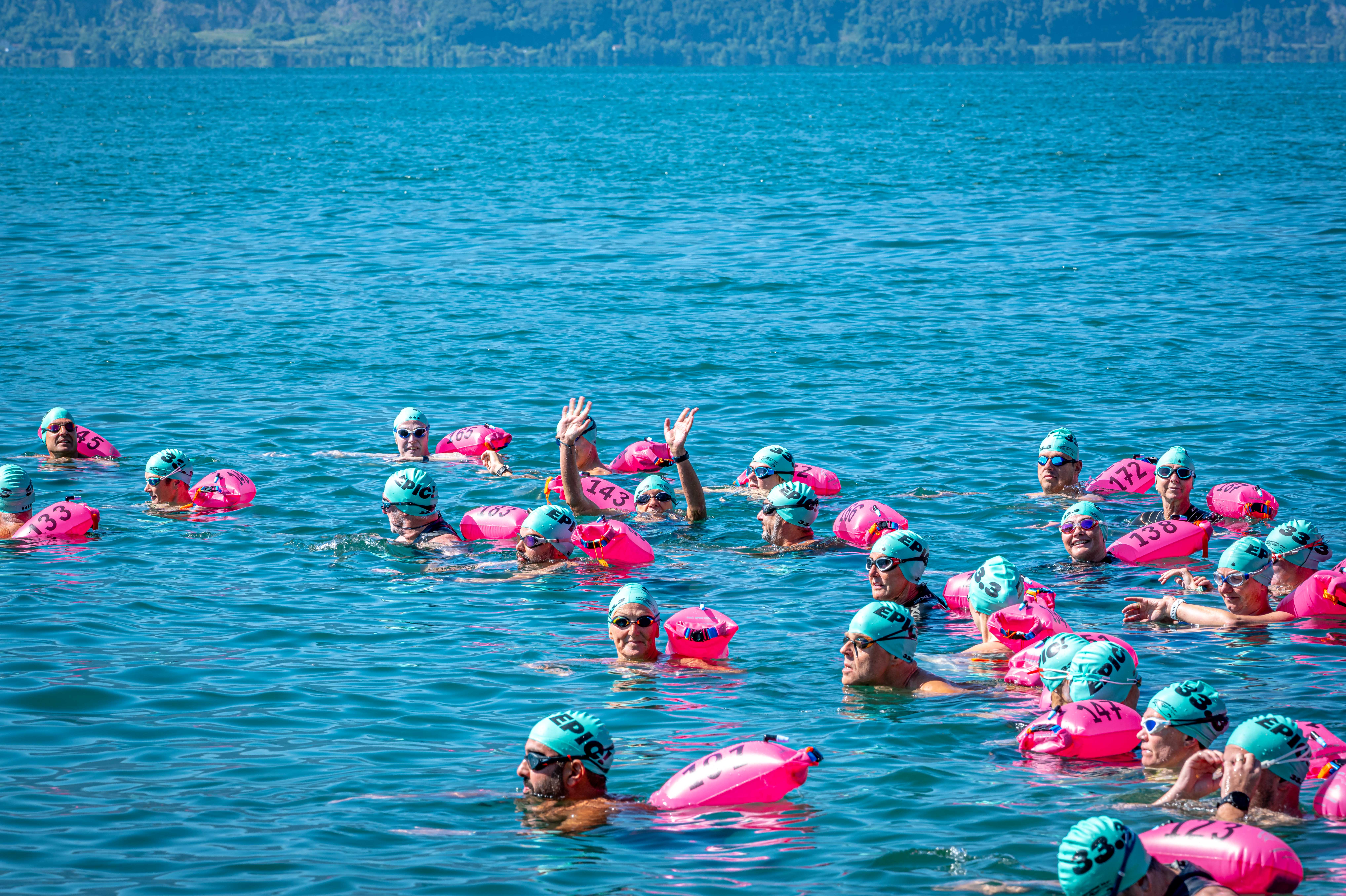Swimmers in warm open water at an UltraSwim 33.3 event in Greece
