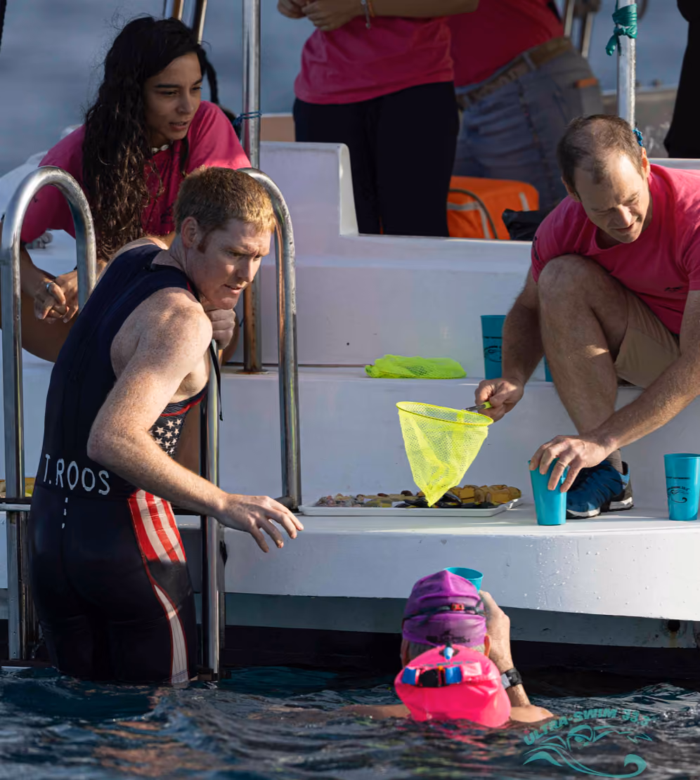 UltraSwim 33.3 feed station volunteer roles