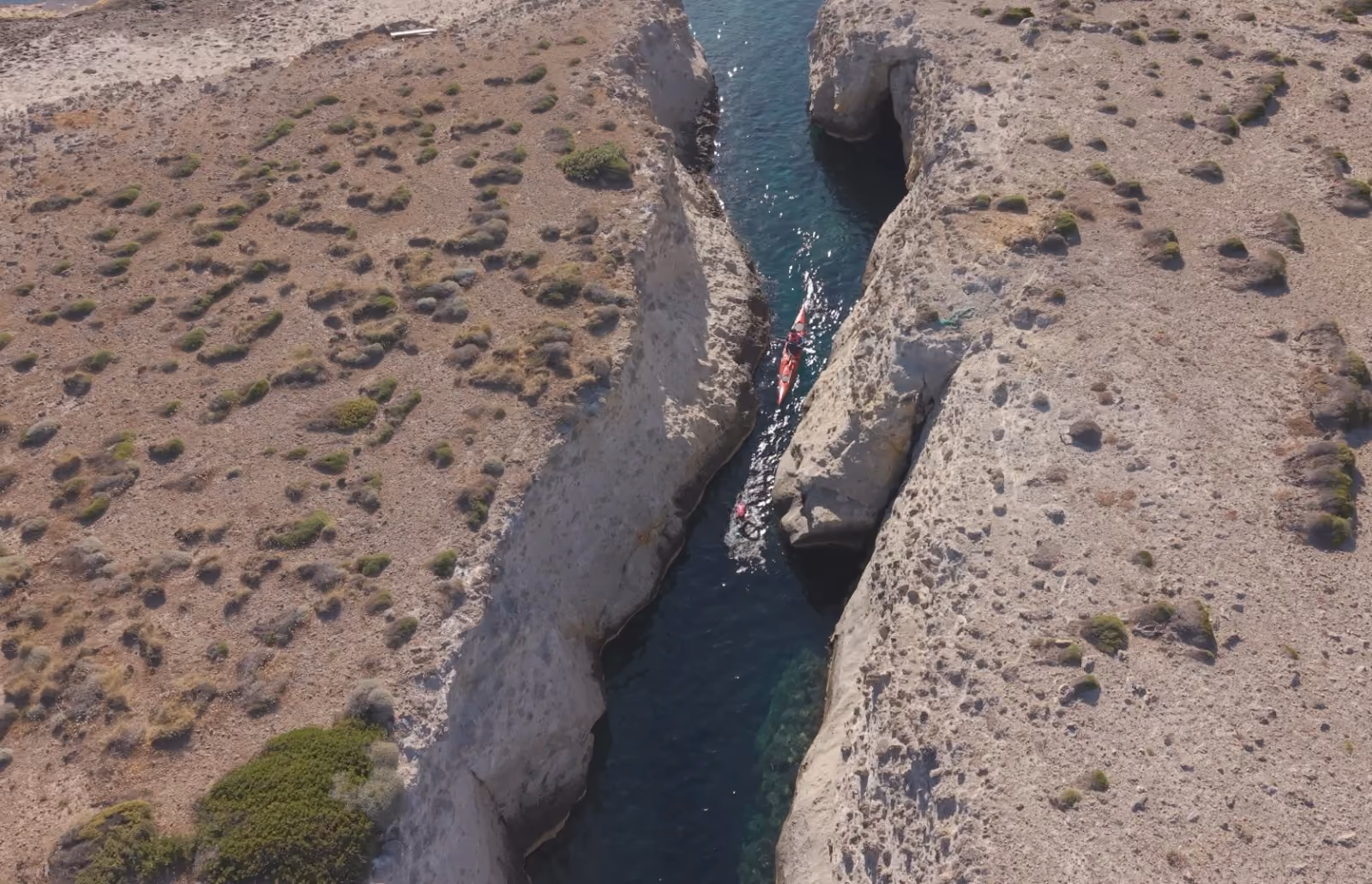 Rock crack swim passage, Milos
