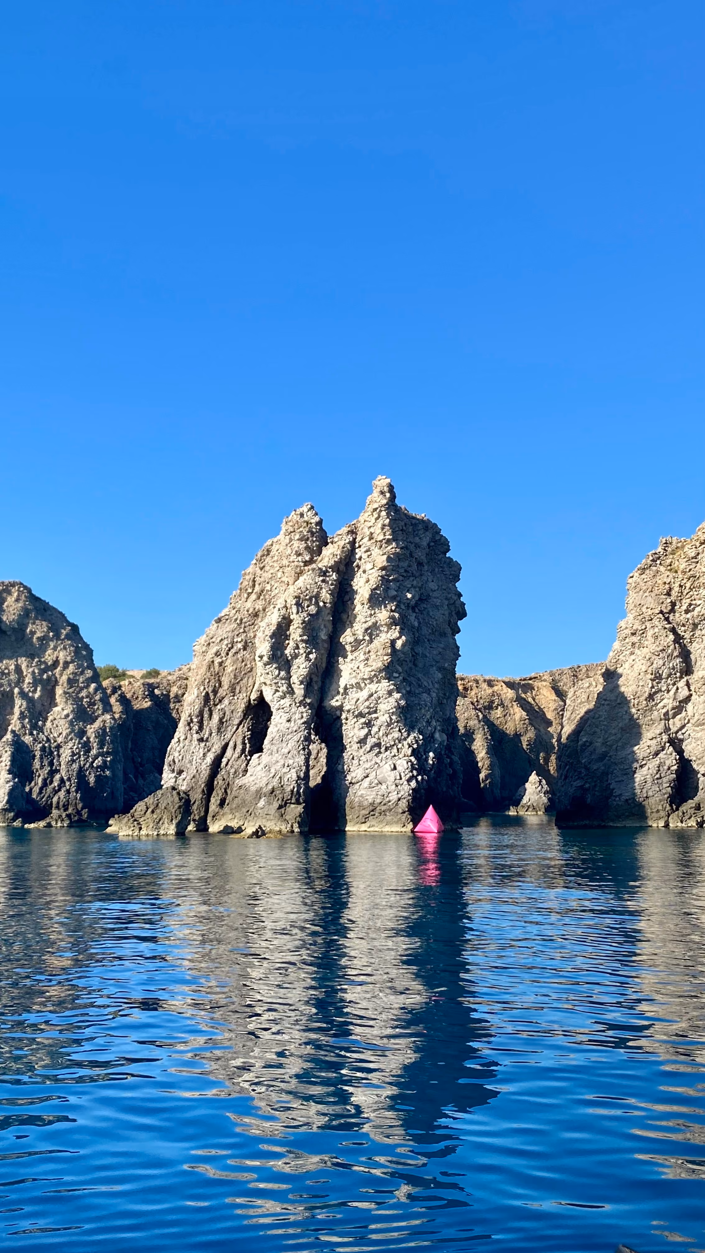 Rock stacks off the coast of Milos, Greece