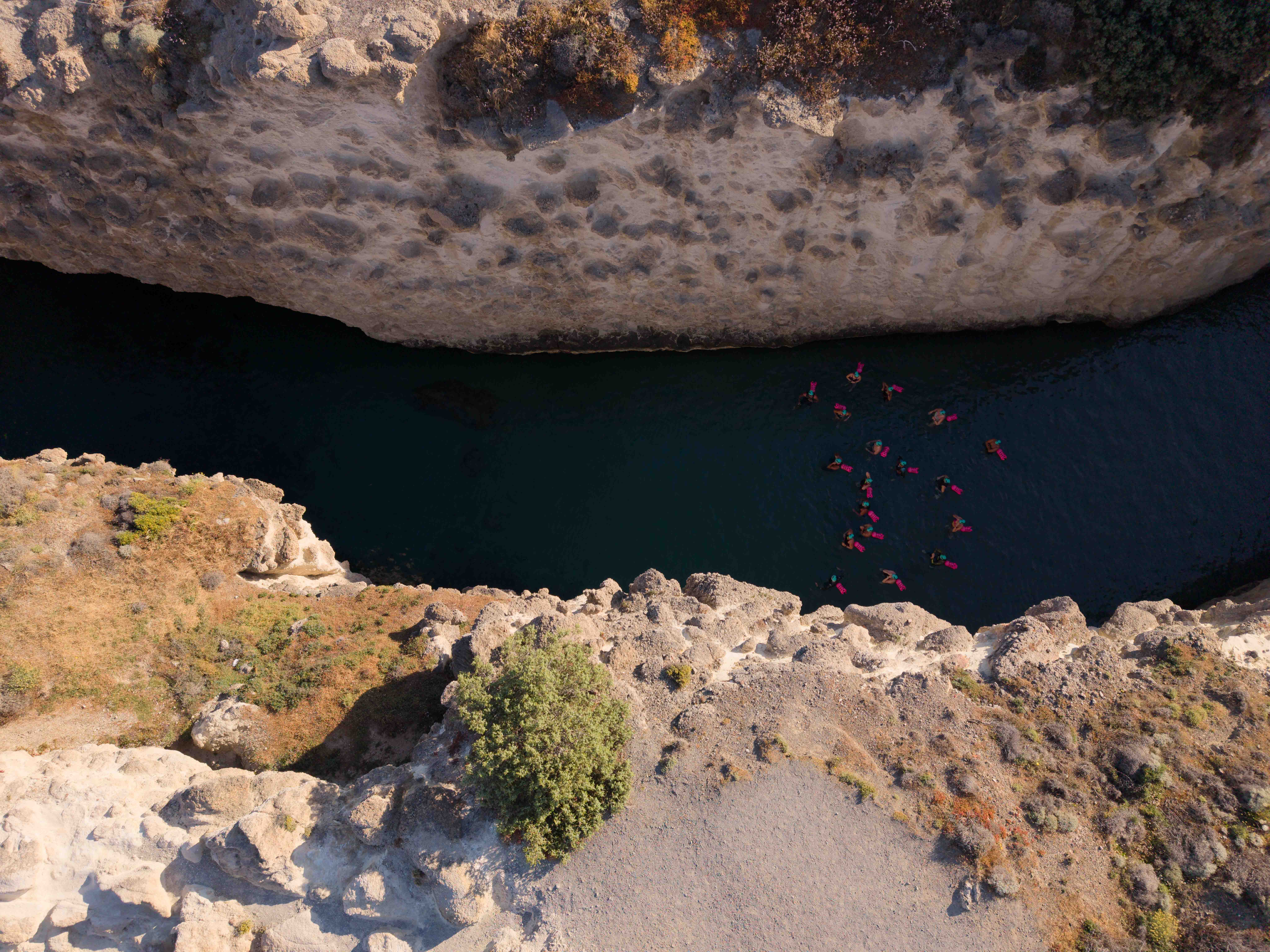 Drone view of the rock crack swim passage, Milos