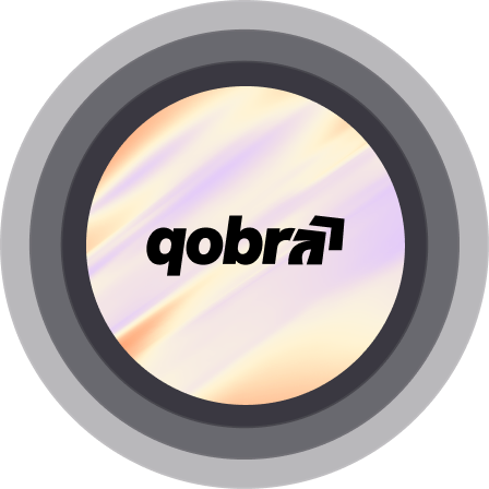 Circular icon with concentric gray and black rings surrounding a center circle that has a soft pastel gradient and features the word 'qobra' in black lowercase letters with a rotated arrow pointing upward to the right.