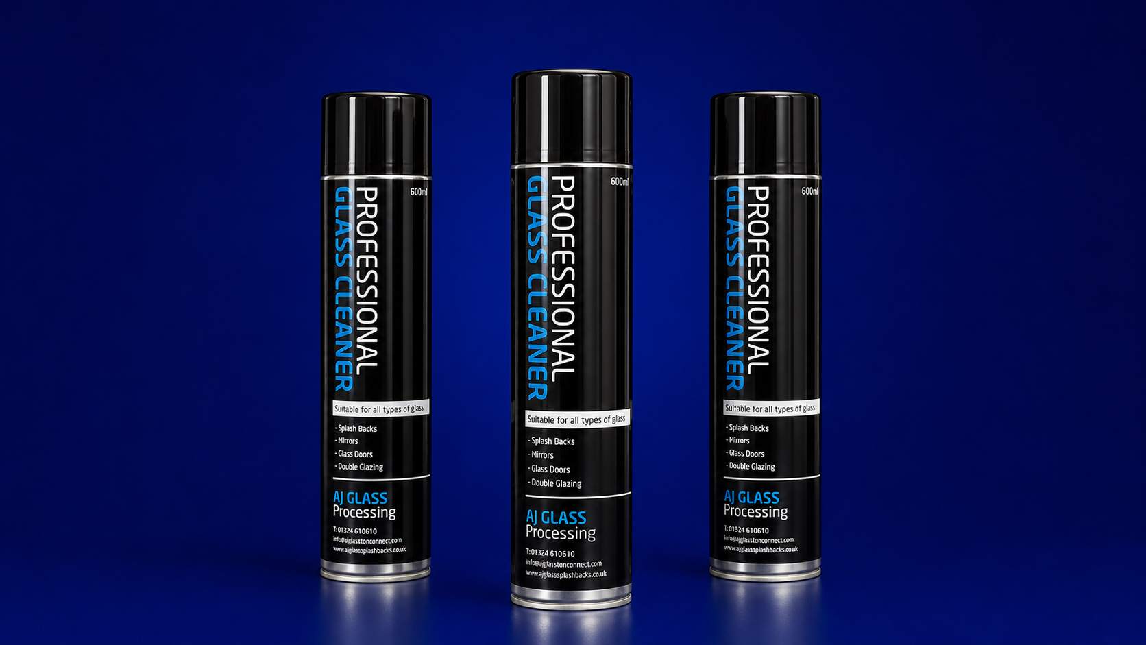 Three black cans of AJ Glass professional glass cleaner on a blue background