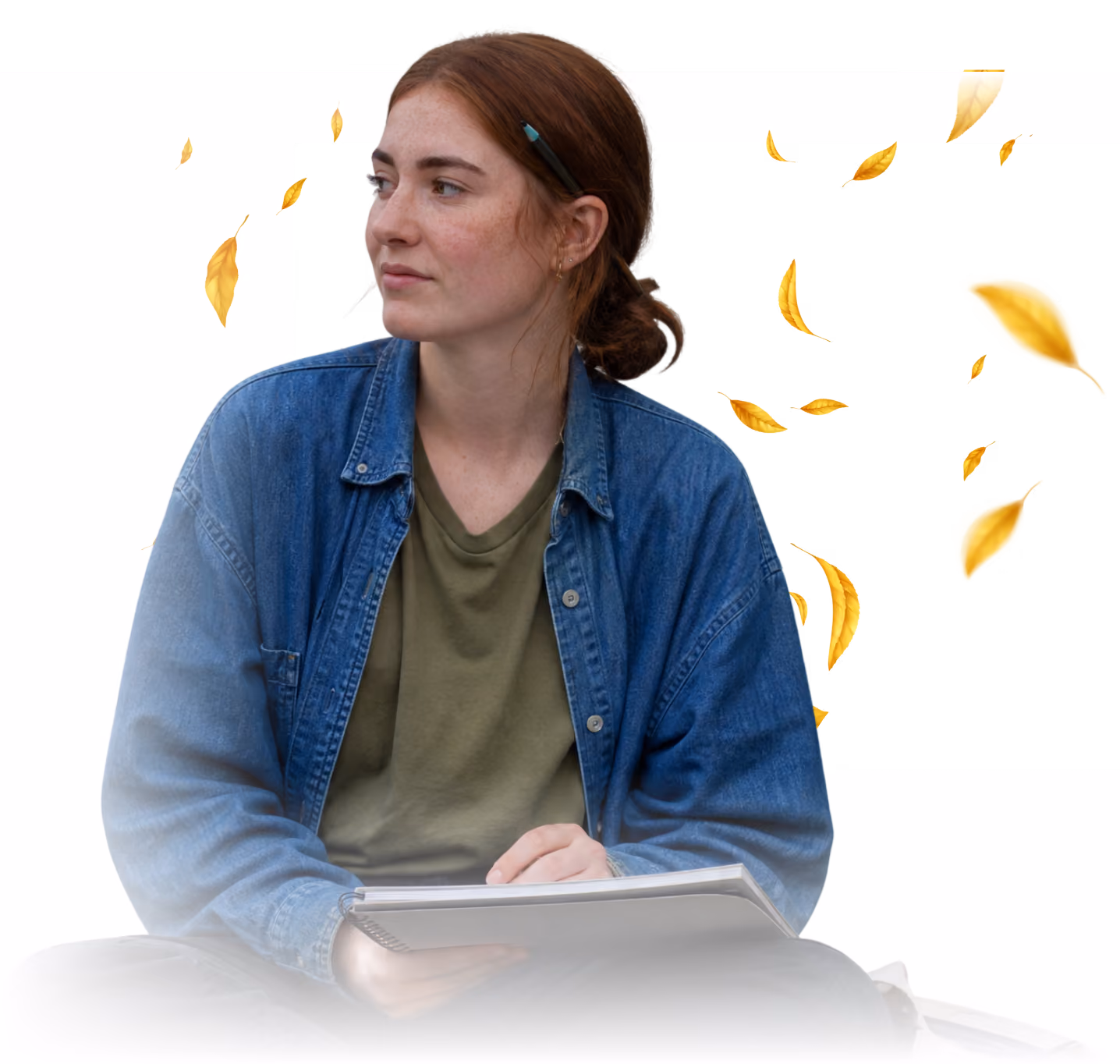 Young woman in a denim jacket holding a tablet
