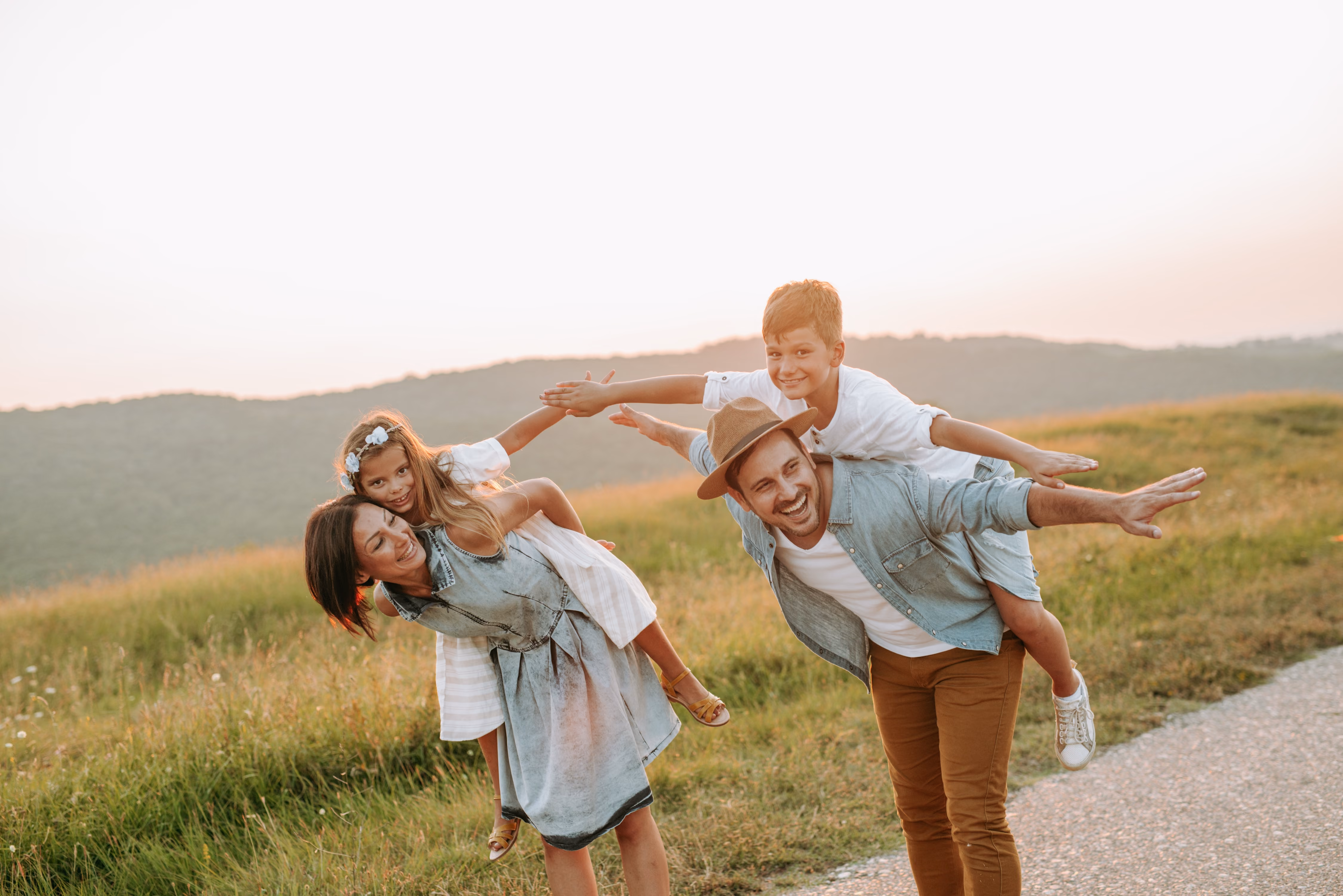 Family smiling in the park stock image