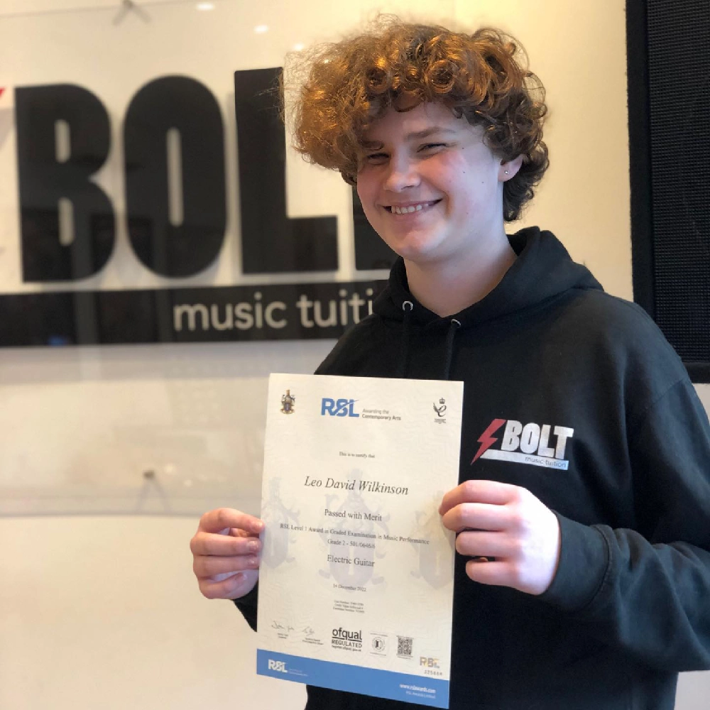 Student achieving a music grade at BOLT