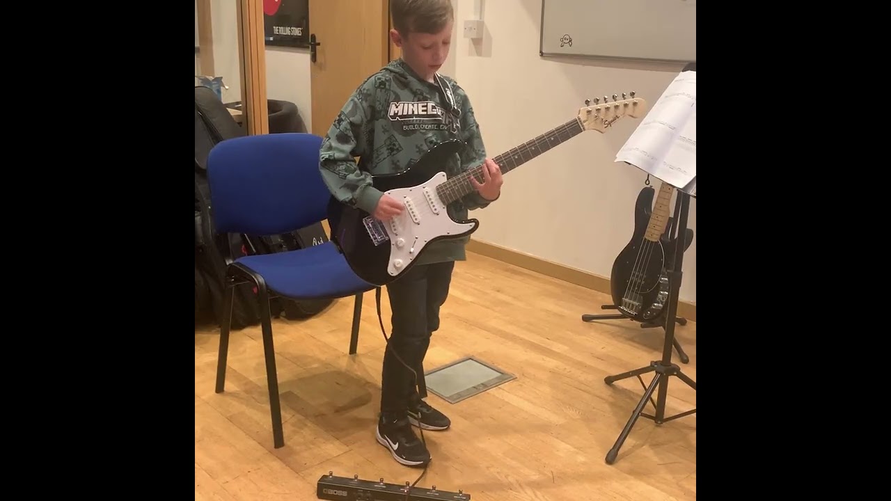 Guitar student after 1 year of lessons