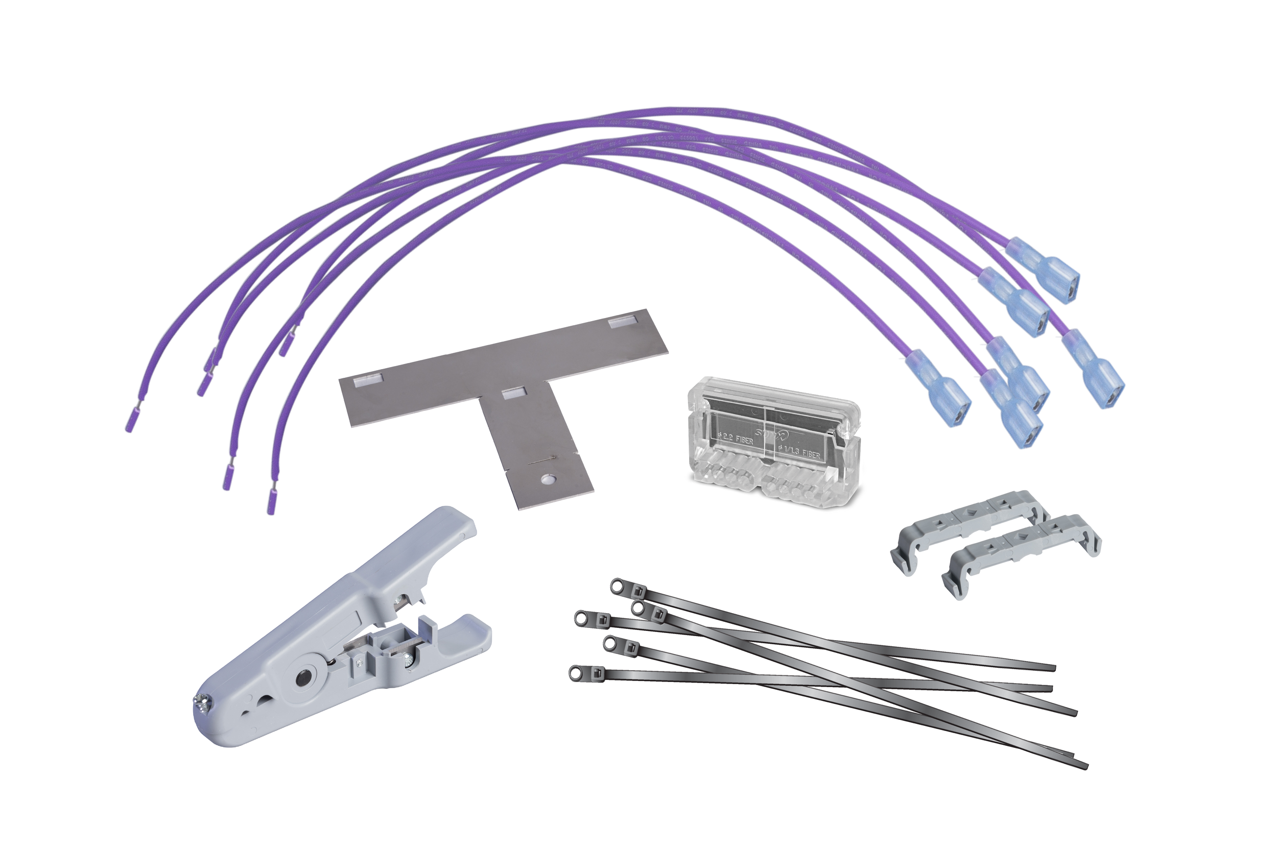 Electrical connectors kit with purple wires, gray connector clips, metal strips, and plastic tool on white background.