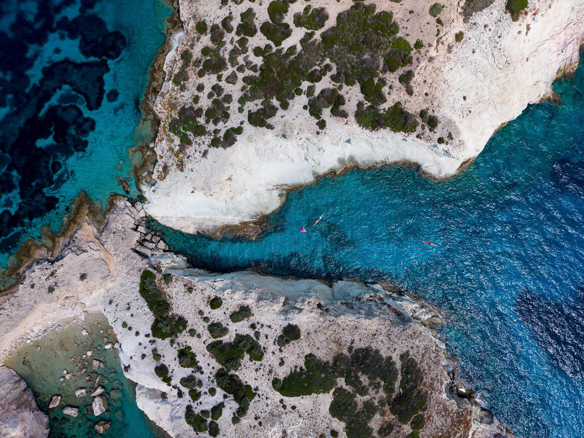 Eighteen Pioneers Discover the Volcanic Coastline of Milos