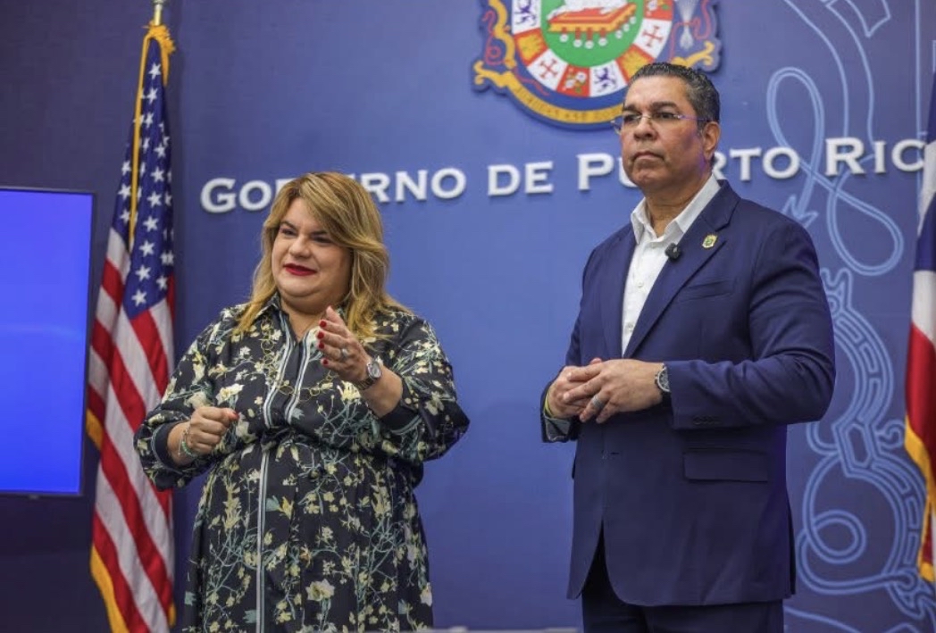 Governor Jenniffer González Colón and Josué Colón announce at forum.