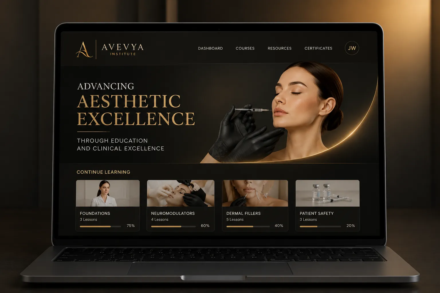 Laptop screen showing Avevya Institute's webpage on aesthetic education with course progress bars.